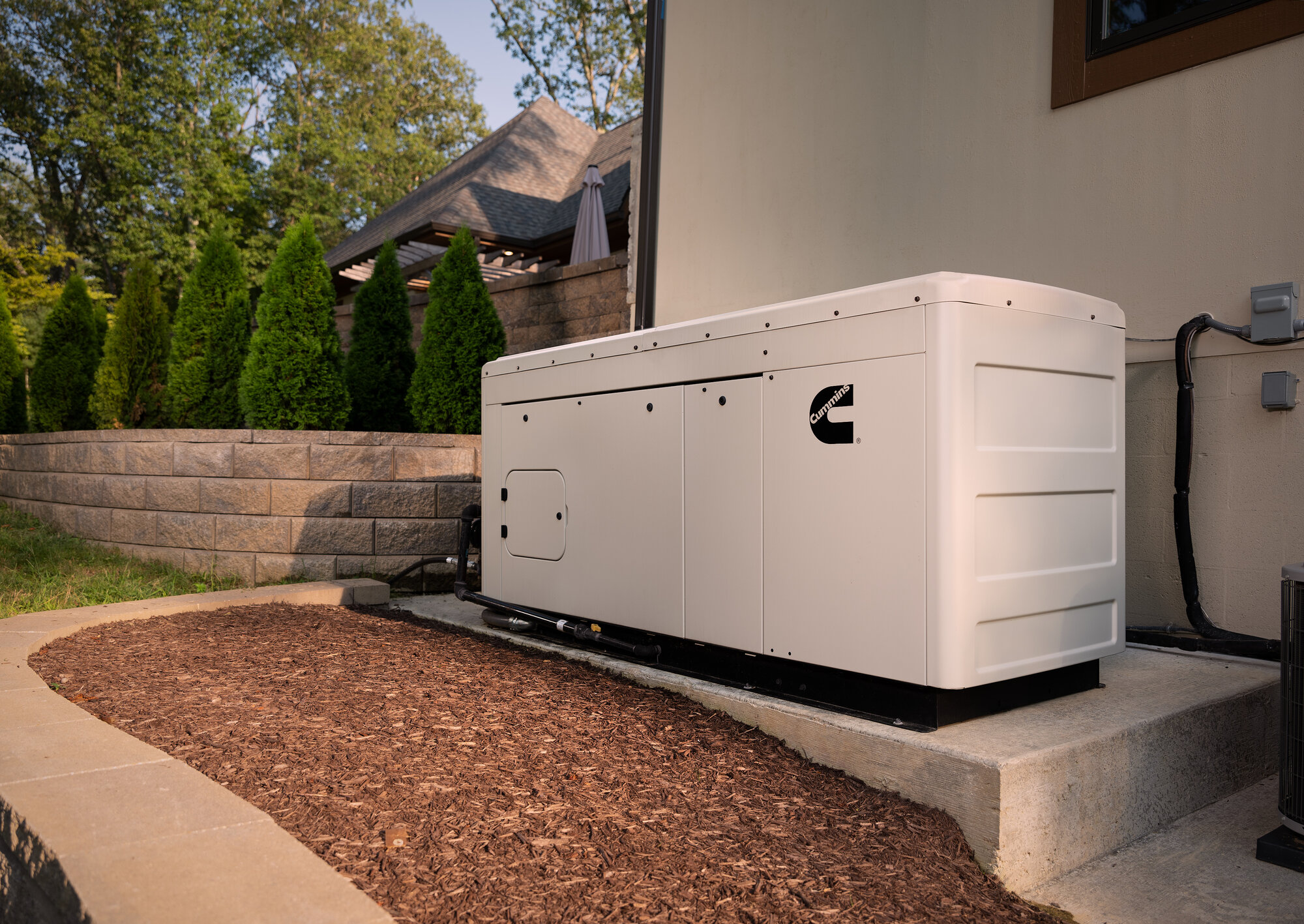 Cummins liquid-cooled diesel standby generator in an enclosed weatherproof cabinet